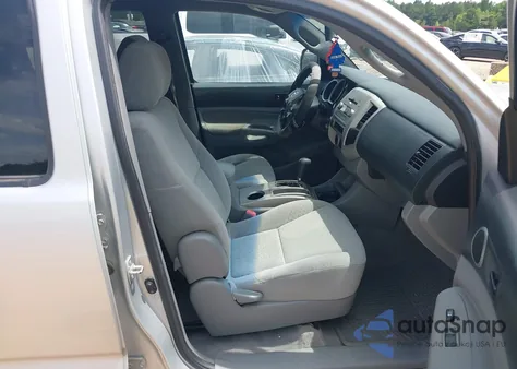 2007 Toyota Tacoma Base V6 z USA, uszkodzony, nr VIN 3TMLU42NX7M009202